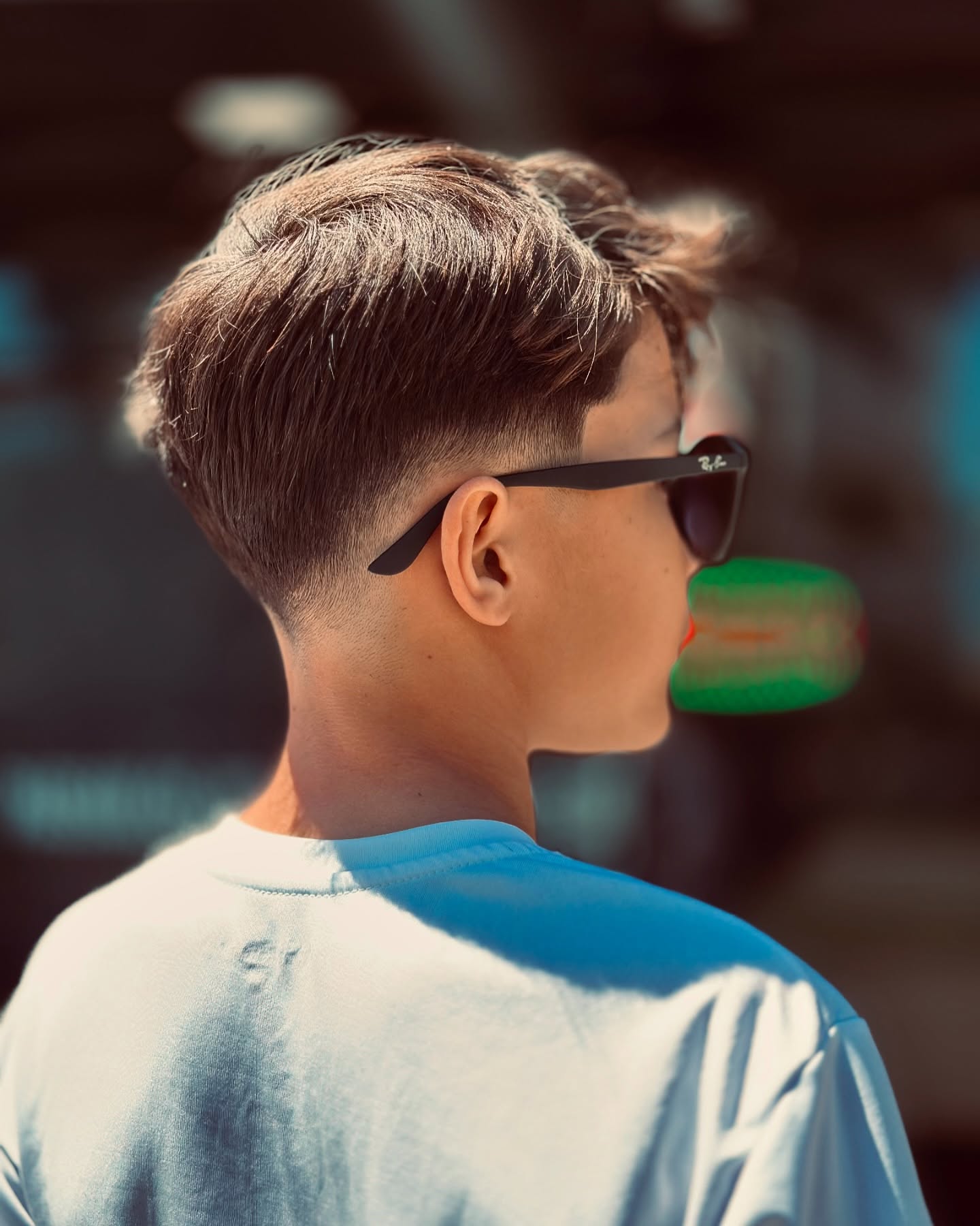 Cliente exibindo corte degradê